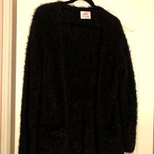 Black sparkly sweater size 16, girls.